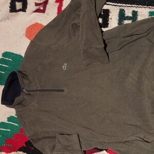 Designer pullover. Quarter zip with extra pockets by lacoste.